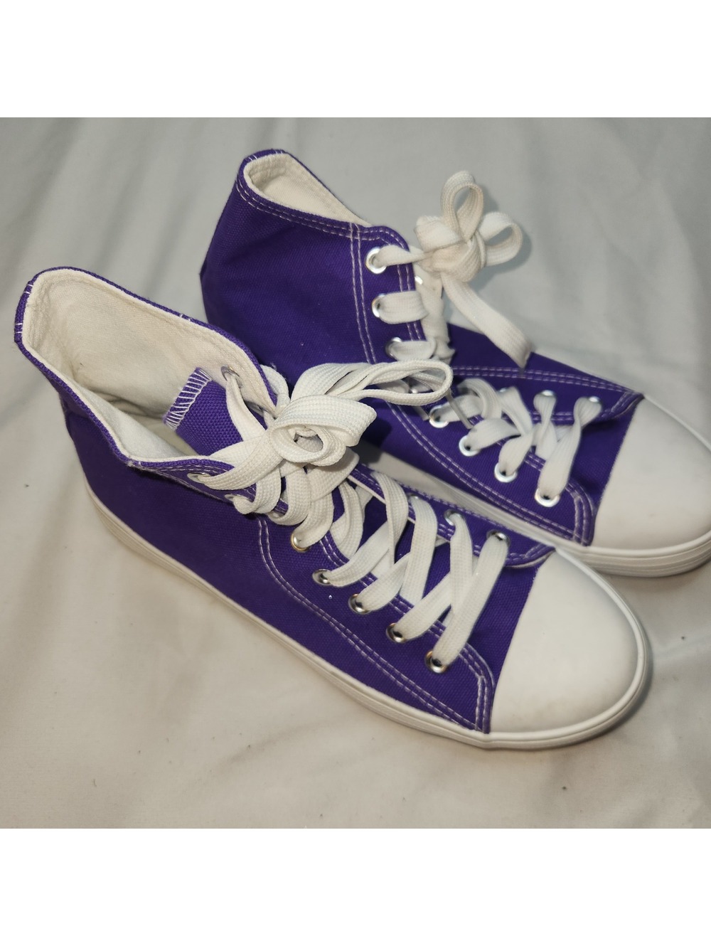 Purple canvas high top sneakers